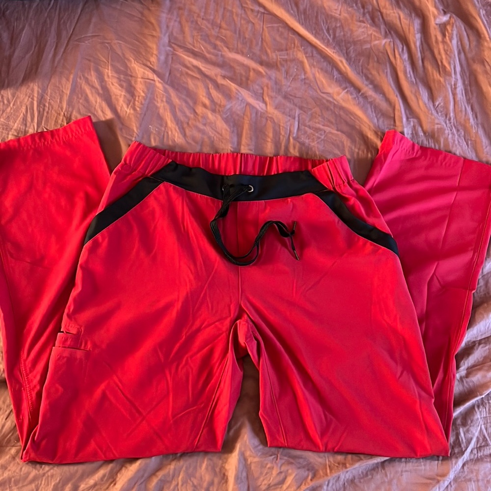 Red healing hands scrub pants